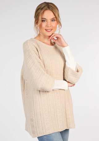 Mitzi Pullover in Beige: Ein eleganter Begleiter aus Lambswool mit lockerer Passform. Bequem und vielseitig kombinierbar. Ideal für jeden Tag!