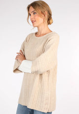 Mitzi Pullover in Beige: Weiche Lambswool, lässiger Schnitt und stylisches Design. Vielseitig kombinierbar und perfekt für entspannte Looks!